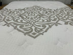 Igel Advance 2500 5ft Kingsize medium mattress with plush surface and supportive structure, shown in a bedroom setting.