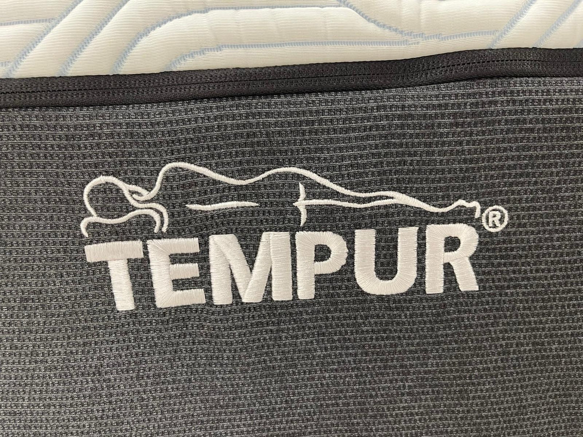 Tempur Pro Plus SmartCool Soft 4FT 6 double mattress with plush surface, white fabric cover, and side panels for support.