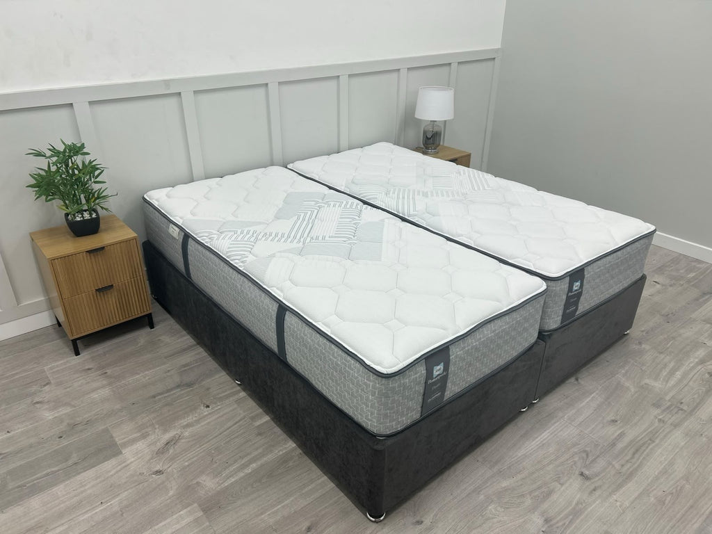 Sealy Newton 6FT Super King Zip and Link Firm Mattress with high-quality fabric and plush surface, designed for comfort and support.