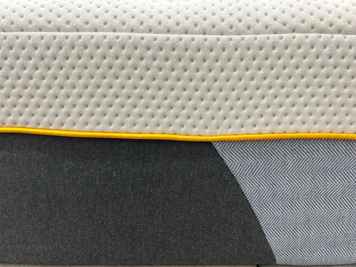 Mlily Premier 3000 Ortho Double mattress, 4ft 6, firm, with plush fabric cover and supportive structure visible in the image.