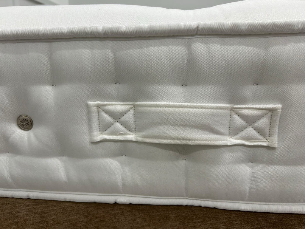 Hypnos Cawthorne Deluxe 5FT Kingsize medium mattress showing plush fabric and quilted surface for comfortable sleep.