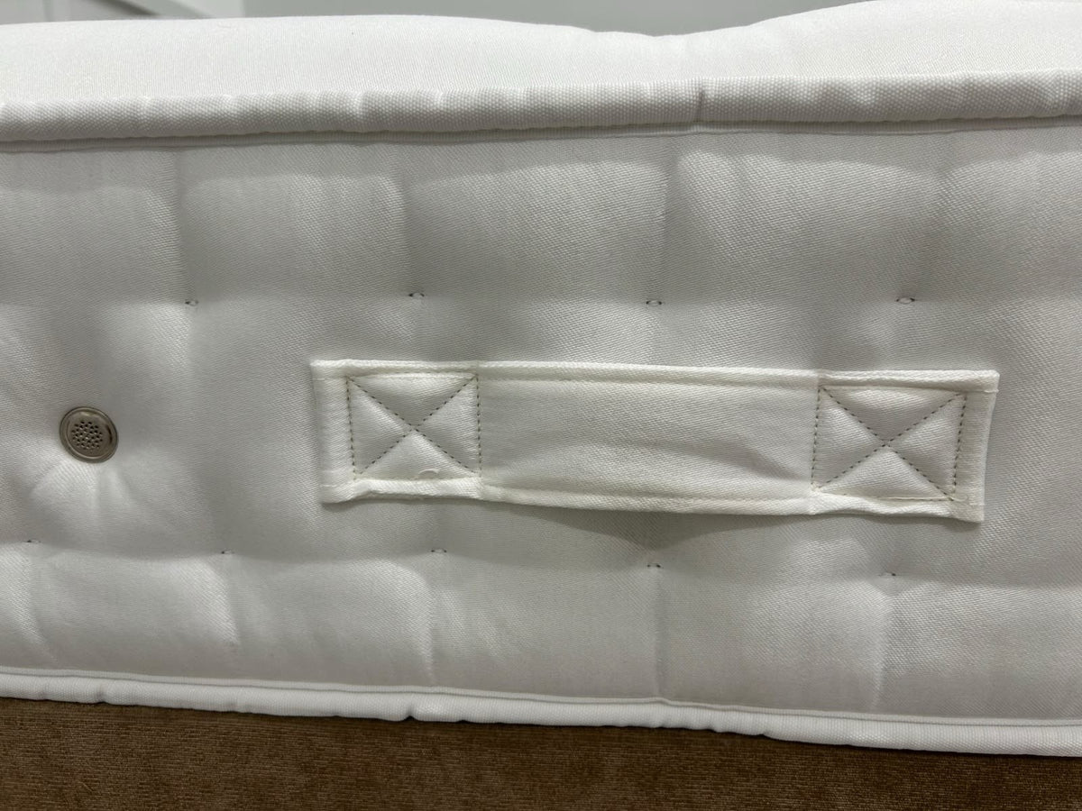 Hypnos Cawthorne Deluxe 5FT Kingsize medium mattress showing plush fabric and quilted surface for comfortable sleep.
