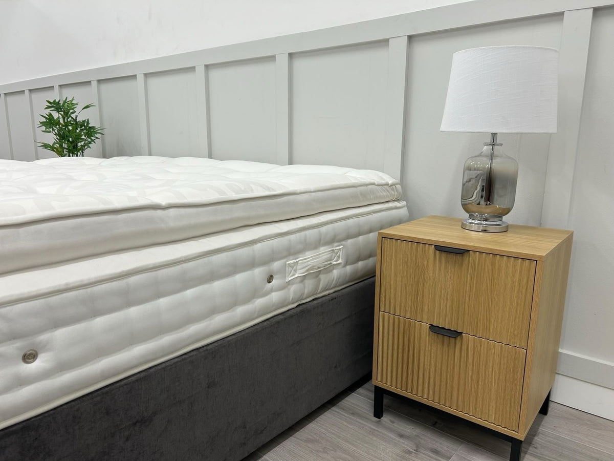Staples Artisan Pure Decadence 5FT Kingsize mattress with plush fabric, showing the soft, quilted surface and supportive structure.