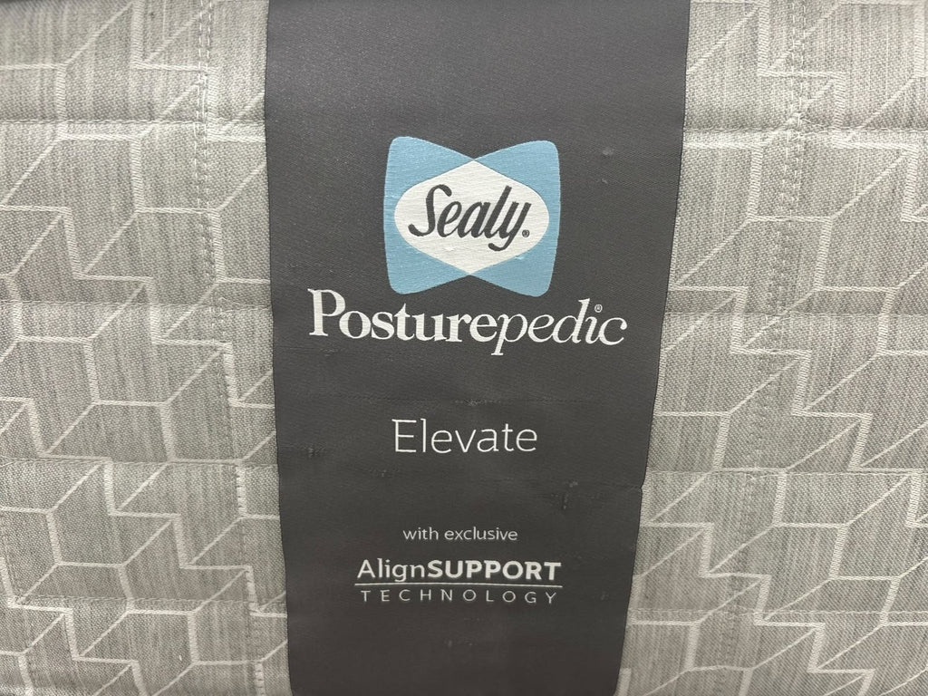 Sealy Newton 6FT Superking Zip and Link Firm Mattress with a close-up of the mattress surface and stitched edges.