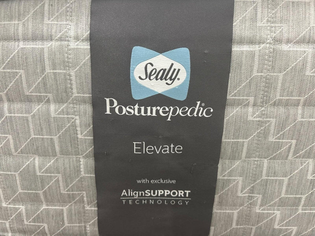 Sealy Newton 6FT Superking Zip and Link Firm Mattress with a close-up of the mattress surface and stitched edges.