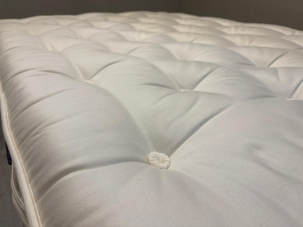 Harrison Spinks 2750 Ely Ortho 4FT 6 double mattress with firm support, featuring plush fabric cover and detailed internal layers.
