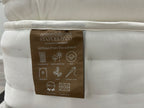 Staples and Co Artisan Pure Decadence 5FT Kingsize mattress with plush fabric and detailed stitching, showcasing its luxurious comfort.