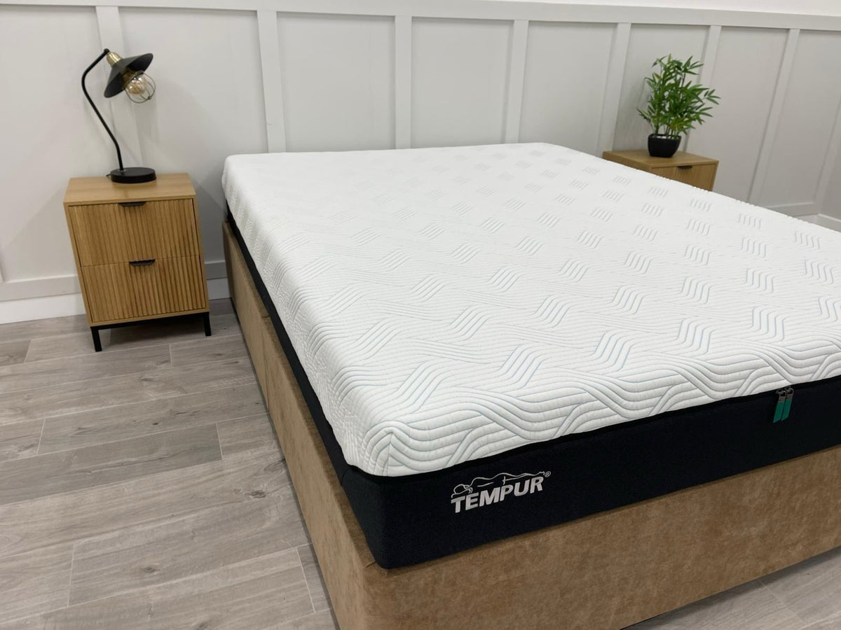 Tempur Pro Plus SmartCool 4ft6 double mattress with soft surface and cooling technology, shown on a bed.