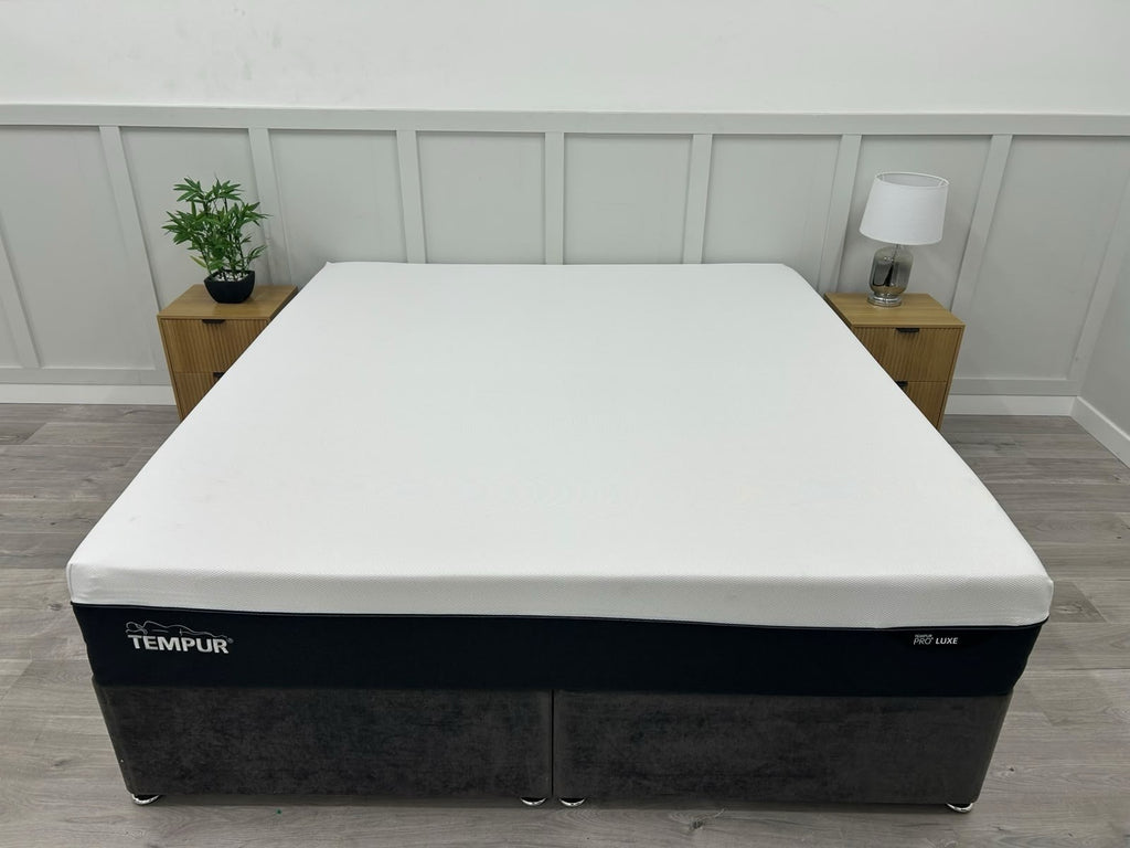 Tempur Pro Luxe Soft 6FT Superking mattress showing a plush, quilted surface in a modern bedroom setting.