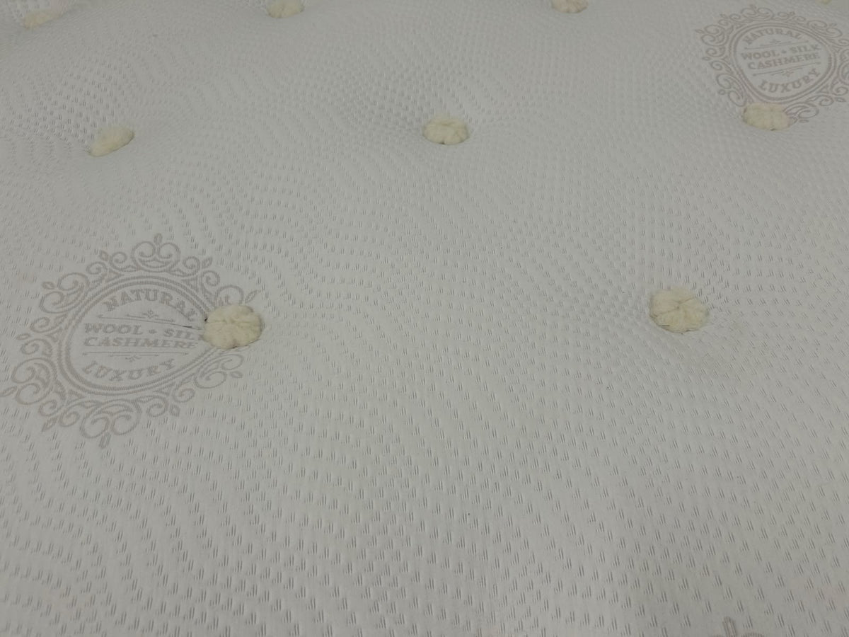 Luxury Sleep Story 4FT6 double pocket sprung mattress with plush surface and supportive design, ideal for comfortable sleep.