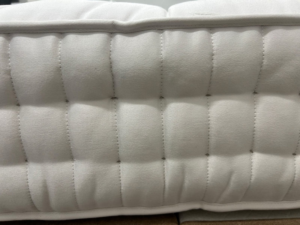 Vispring Baronet Superb 5ft Kingsize firm spring mattress with plush fabric, showcasing luxurious comfort and high-quality craftsmanship.