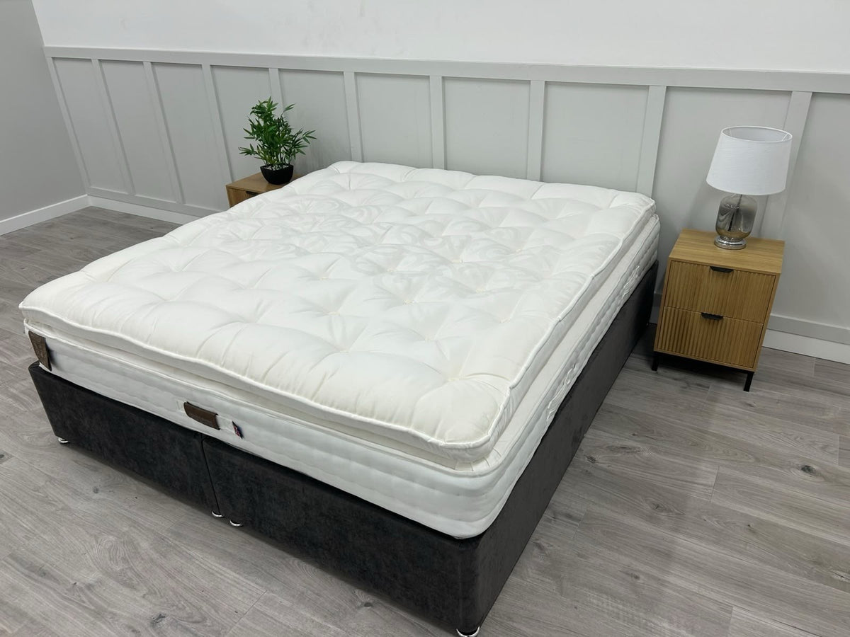 Staples Staples and Co Artisan Pure Decadence 5FT Kingsize mattress, featuring plush fabric and supportive structure for comfortable sleep.
