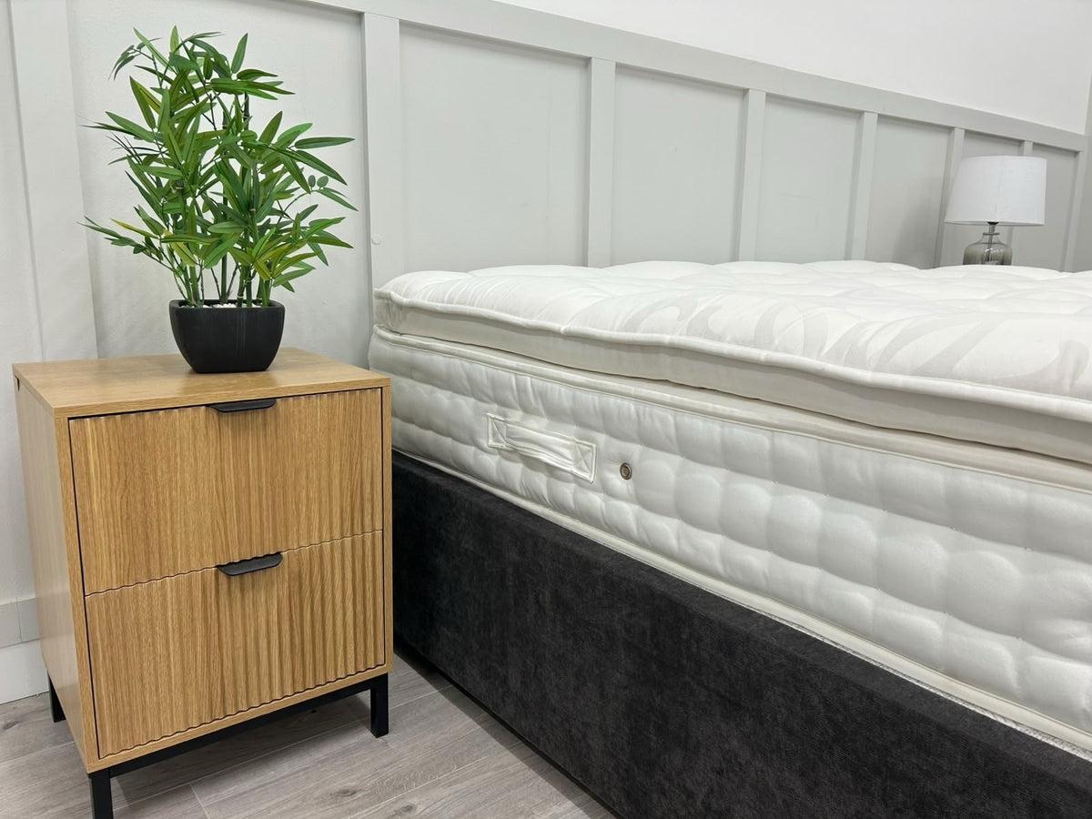 Staples Staples and Co Artisan Pure Decadence 5FT Kingsize mattress with firm support, featuring plush fabric and detailed stitching.