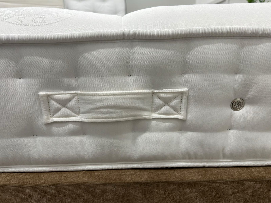Hypnos Cawthorne Deluxe 5FT Kingsize medium mattress with plush fabric and supportive construction, shown in the image.