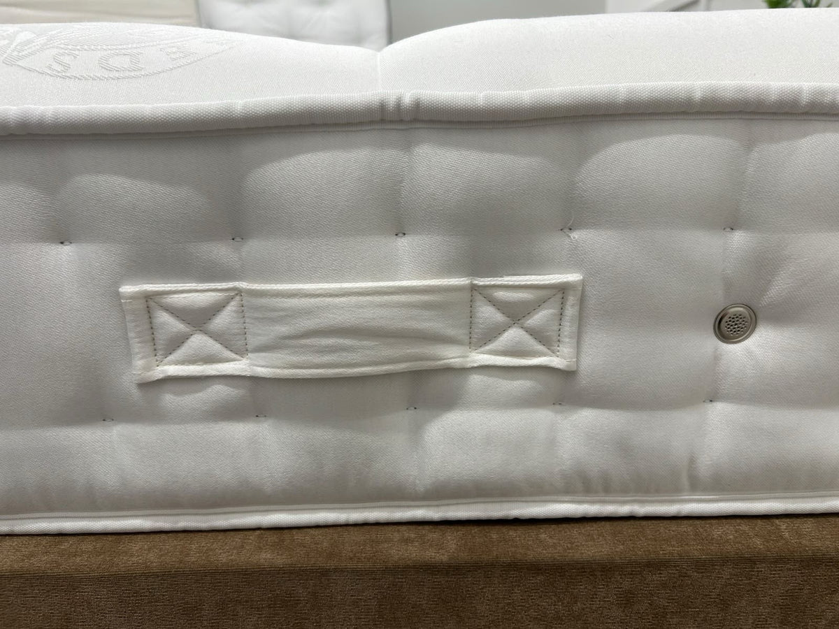 Hypnos Cawthorne Deluxe 5FT Kingsize medium mattress with plush fabric and supportive construction, shown in the image.