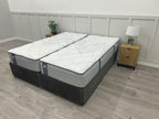 Sealy Newton 6FT Superking zip and link firm mattress with plush fabric cover and visible stitching, designed for comfort and support.