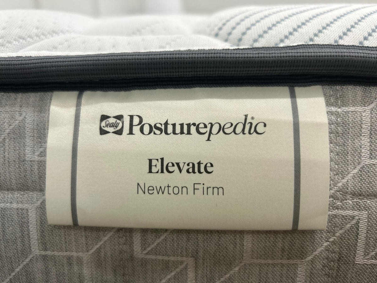 Sealy Newton 6FT Super King Zip and Link Firm Mattress with plush fabric cover and visible stitching, designed for premium comfort.