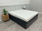 Emma Diamond Hybrid 6FT Superking mattress with medium firm support, shown on a bed with bedding and pillows.