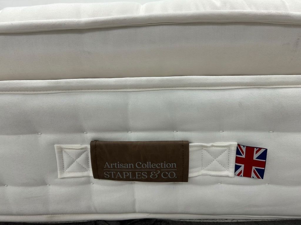 Staples and Co Artisan Pure Decadence 5FT Kingsize mattress with plush fabric and supportive design, shown on bed frame.