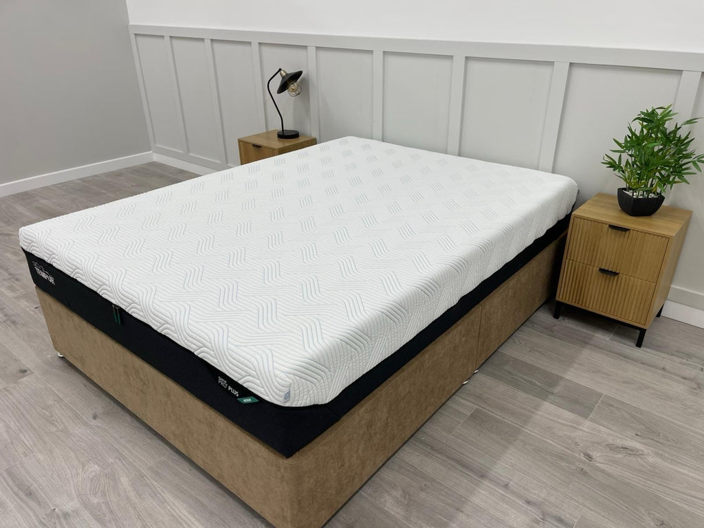 Tempur Pro Plus SmartCool 4ft 6 double mattress with soft surface and cooling technology, shown in a bedroom setting.
