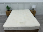 Hypnos Luxurious Earth 02 double 4ft6 mattress with plush fabric cover and plush interior, designed for comfort and support.