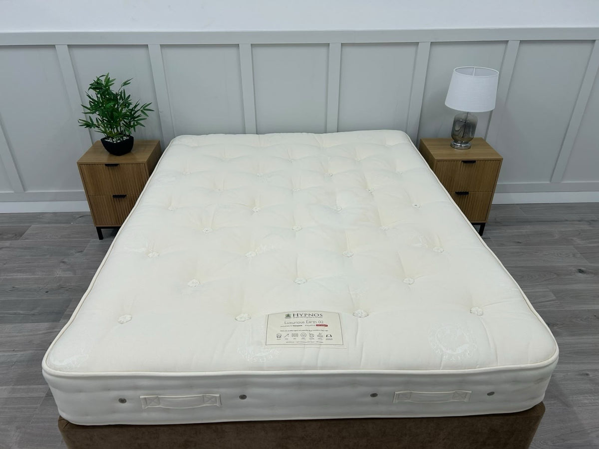 Hypnos Luxurious Earth 02 double 4ft6 mattress with plush fabric cover and plush interior, designed for comfort and support.