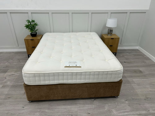 John Lewis Harrison Spinks Grassington 5750 Pocket Mattress 5FT Kingsize with medium firm support, neatly made with fabric covering.