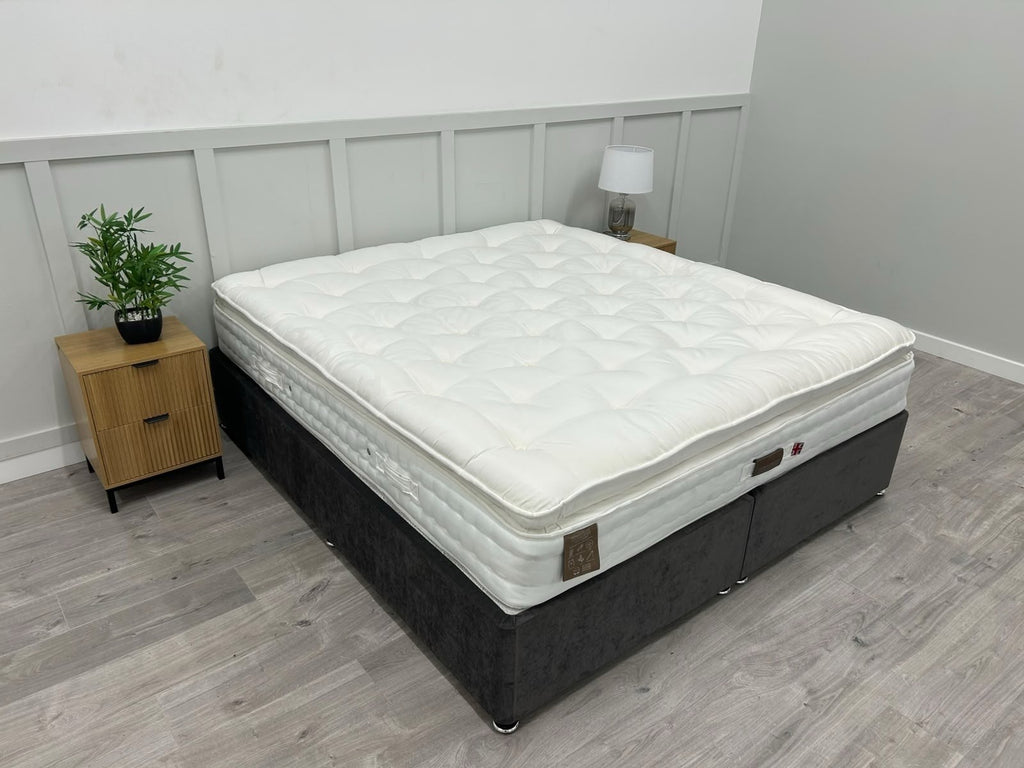 Staples and Co Artisan Pure Decadence 5FT Kingsize mattress with plush fabric and detailed stitching, designed for comfort and support.