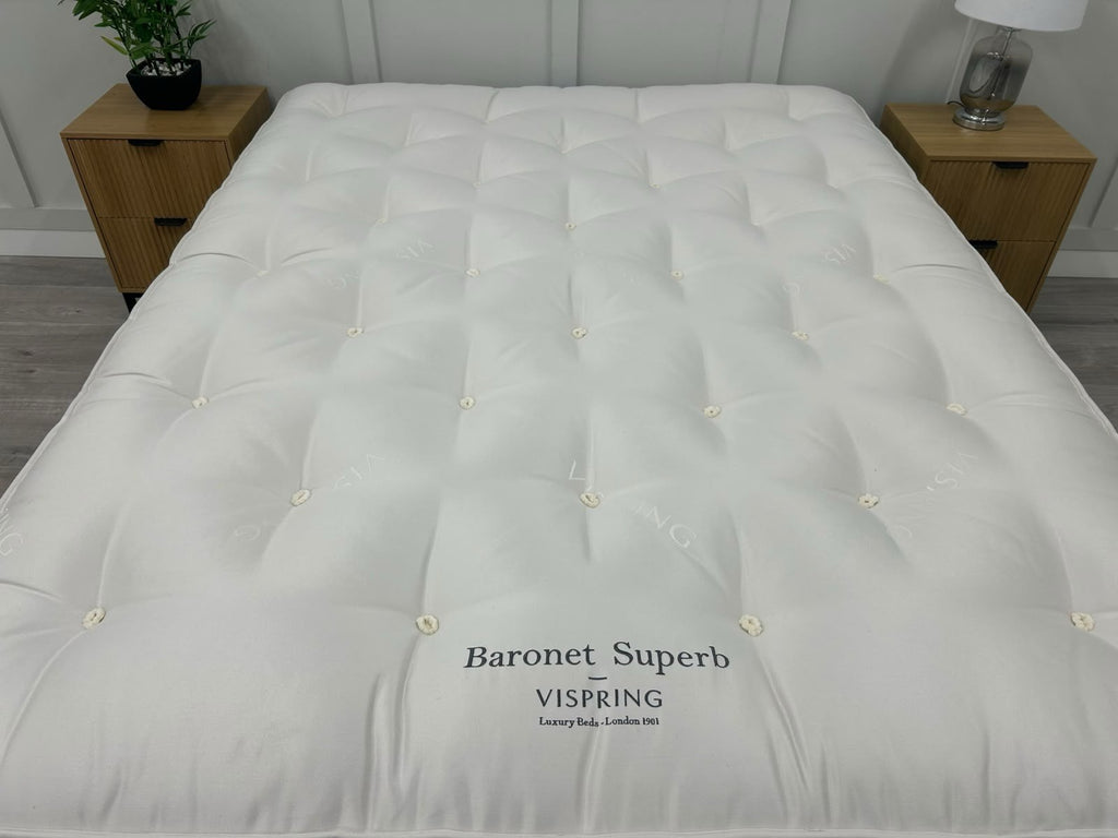 Vispring Baronet Superb 5FT Kingsize firm mattress with plush fabric and detailed stitching, designed for comfort and support.
