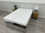 Mlily Premier 3000 Ortho 4ft 6 double mattress with firm support, shown with textured fabric and neatly made bedding.