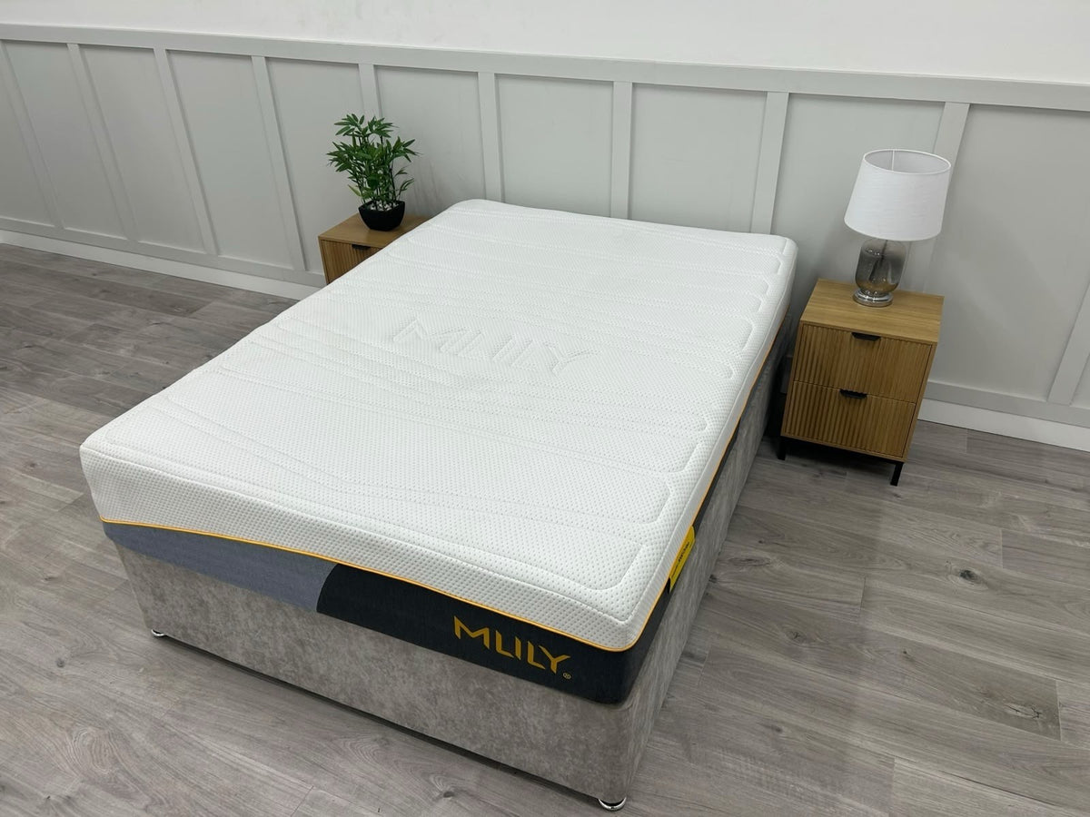 Mlily Premier 3000 Ortho 4ft 6 double mattress with firm support, shown with textured fabric and neatly made bedding.