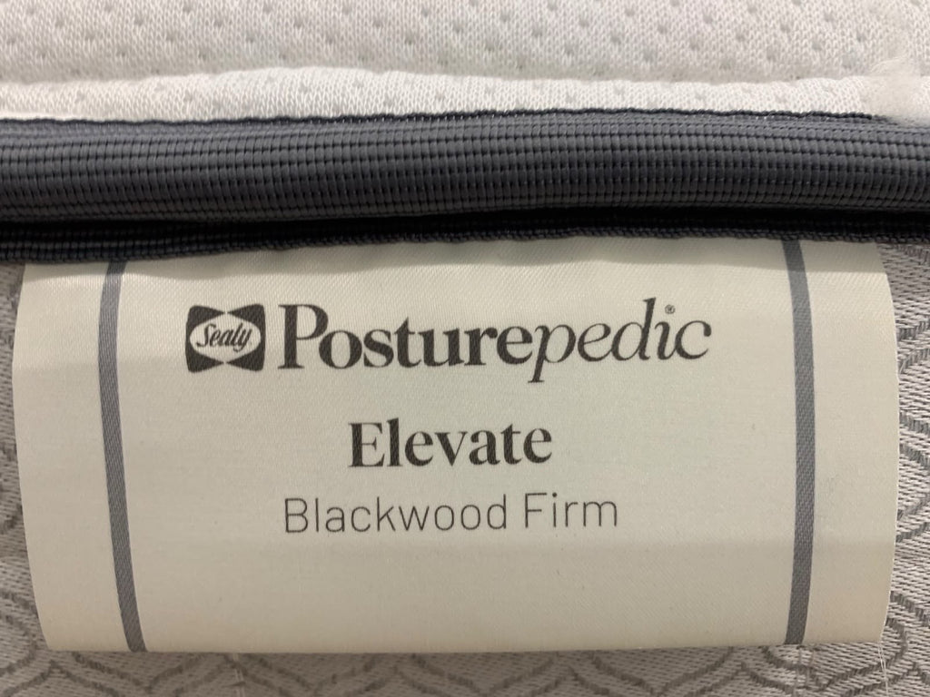 Sealy Posturepedic Elevate Blackwood 3FT single firm mattress, side view sealed in packaging