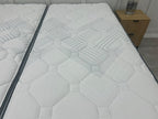 Sealy Newton 6FT Super King Zip and Link Firm Mattress with white fabric cover and plush surface, designed for comfort and support