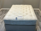 Harrison Spinks 2750 Ely Ortho 4FT 6 double mattress with firm support, showing plush fabric and mattress layers.