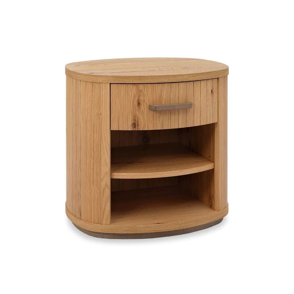 Weathered oak bedside cabinet with single drawer and curved design by Bentley Designs, showcasing a rustic wood finish.