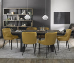 Weathered oak extending dining table with six yellow fabric chairs by Bentley Designs, shown with chairs arranged around the table.
