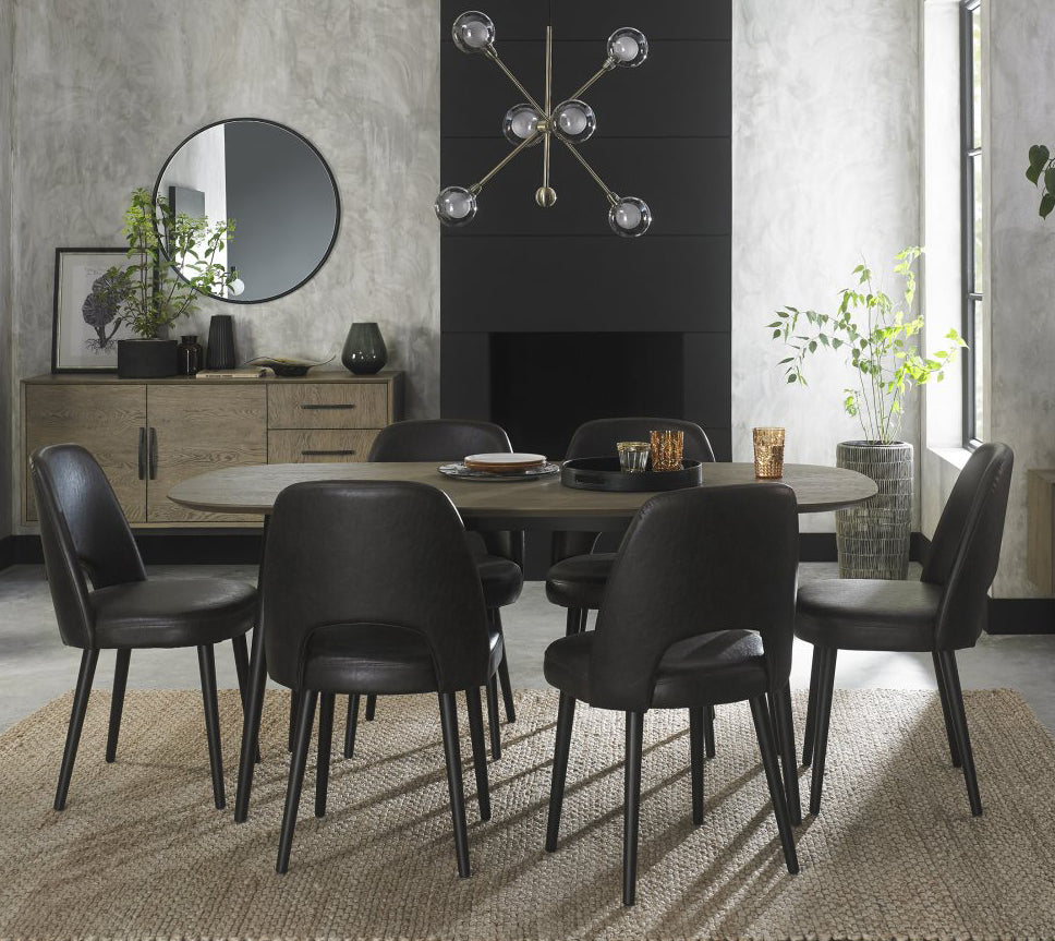 Weathered Oak dining table with six grey leather chairs, Bentley Designs table and chair set for stylish dining rooms.