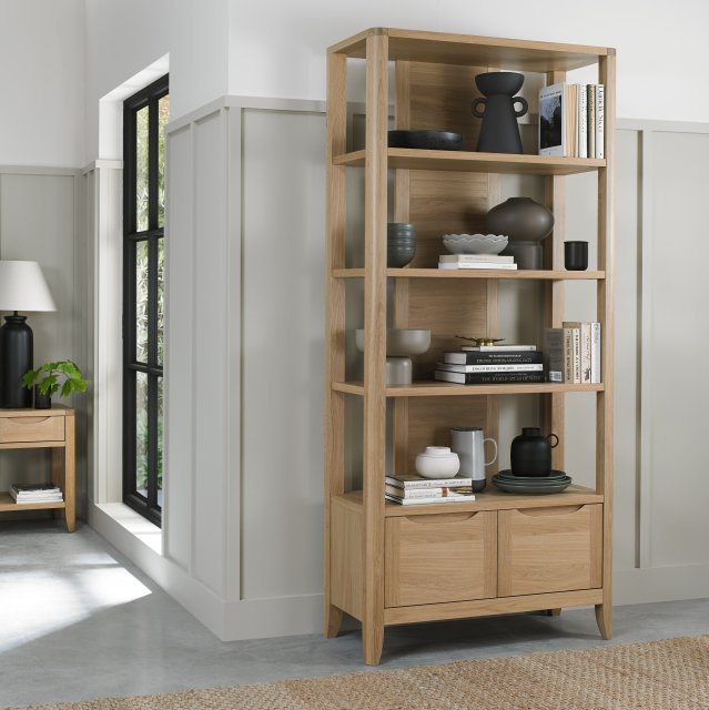 Tall oak lacquer finish open display shelving unit by Bentley Designs, showcasing multiple shelves for storage and display.
