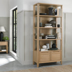 Tall oak lacquer finish open display shelving unit by Bentley Designs, showcasing multiple shelves for storage and display.