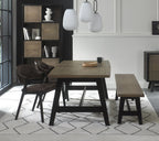Weathered oak dining table set with two brown chairs and a small bench by Bentley Designs, showing the rustic table and seating.