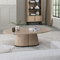 Light Oak Oval Coffee Table With Peppercorn Legs