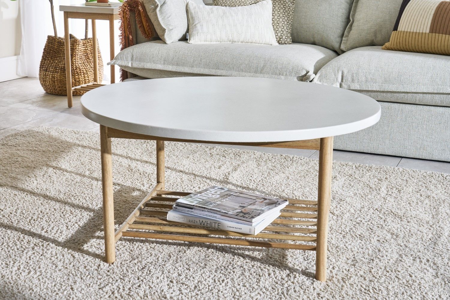 White Round Coffee Table with Lower Rack in Smooth Finish