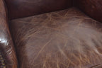 Vintage Brown Distressed Leather Upholstered Armchair with Studded Detailing - Home Furniture Interiors