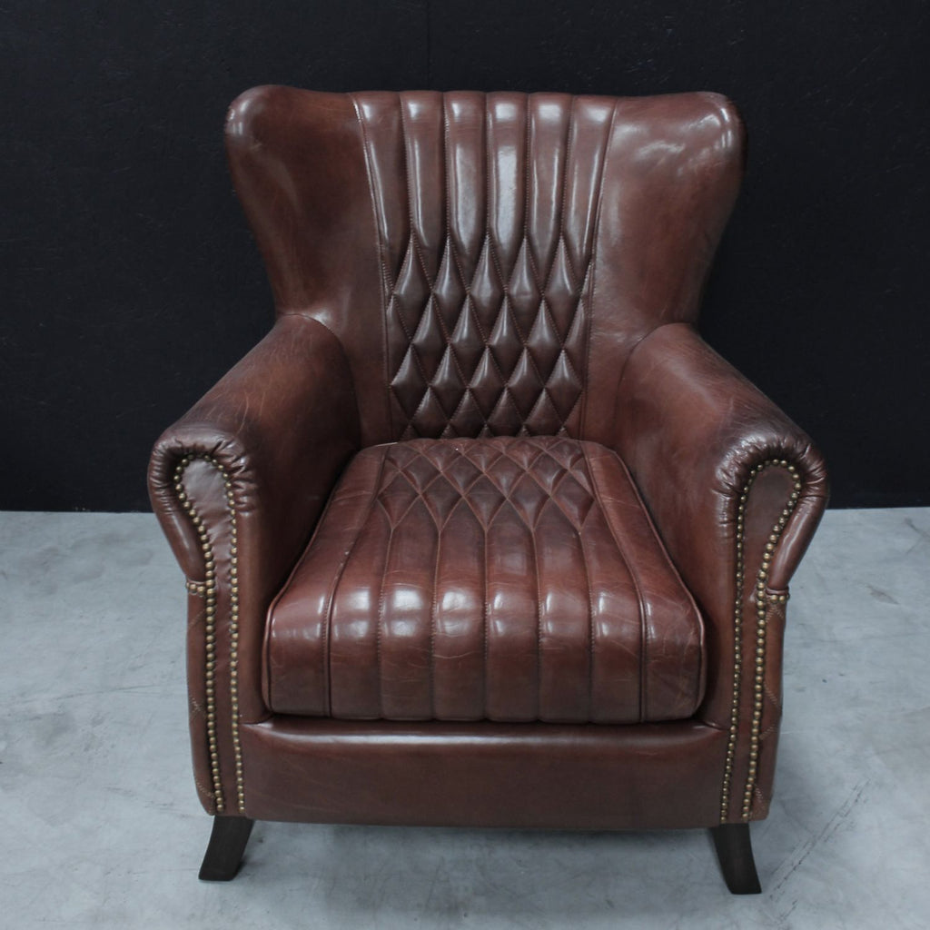 Vintage Brown Flared Back Leather Upholstered Armchair with Brass Detailing - Home Furniture Interiors