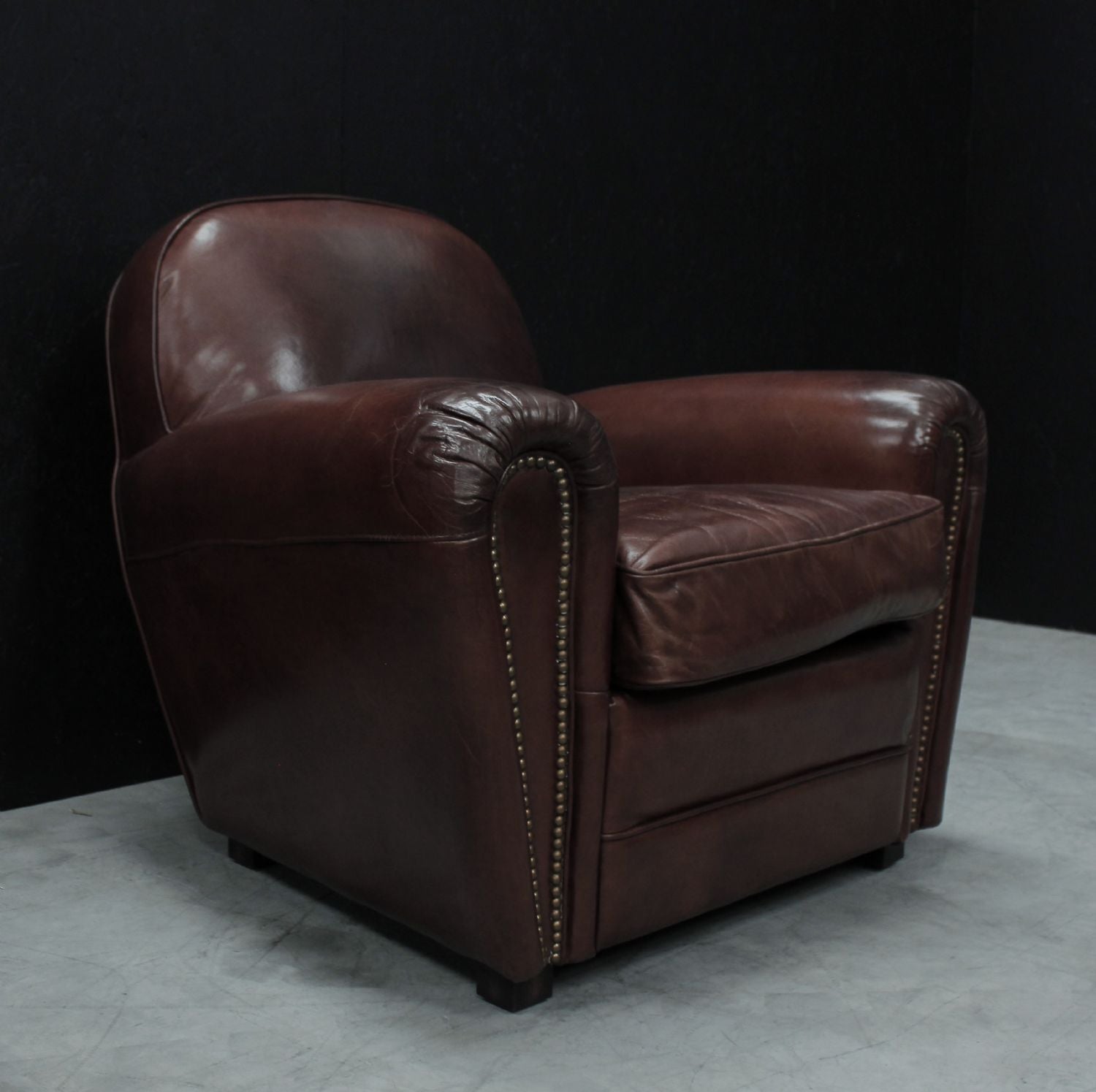Vintage Brown Leather Upholstered Art Deco Armchair with Brass Stud Detailing - Home Furniture Interiors