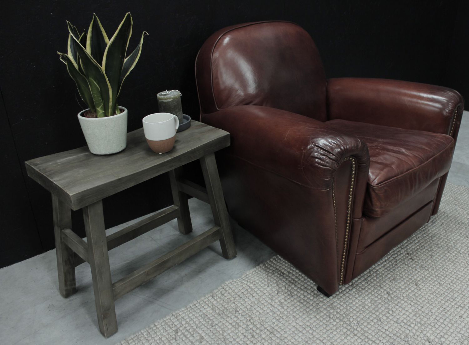 Vintage Brown Leather Upholstered Art Deco Armchair with Brass Stud Detailing - Home Furniture Interiors