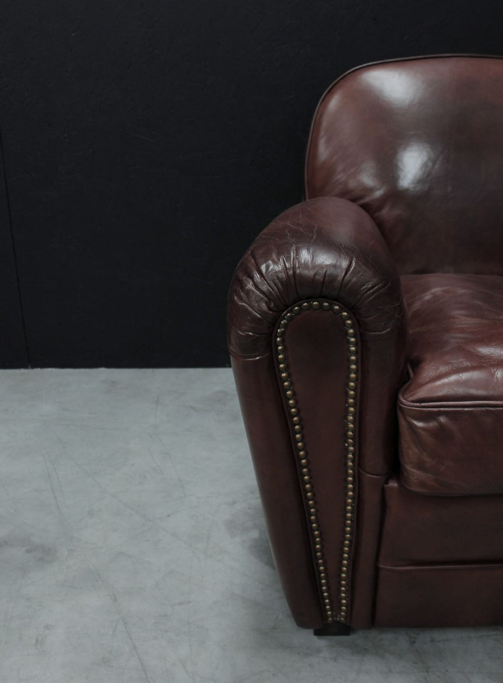 Vintage Brown Leather Upholstered Art Deco Armchair with Brass Stud Detailing - Home Furniture Interiors