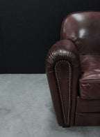Vintage Brown Leather Upholstered Art Deco Armchair with Brass Stud Detailing - Home Furniture Interiors