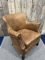 Vintage Style Brown Leather Lounge Armchair with Stud Detailing and Curved Back