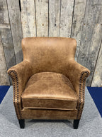 Vintage Style Brown Leather Lounge Armchair with Stud Detailing and Curved Back - Home Furniture Interiors